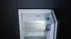 An empty refrigerator with the door open. Produktbild-Vorschau