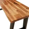 A close-up view of a wooden bench with a live edge and black metal legs. Náhled obrázku produktu