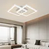 A modern living room with a stylish ceiling light. Produktbild-Vorschau