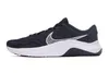 A side view of a black Nike sneaker with a white sole and a white Nike swoosh logo. Náhľad obrázku produktu