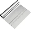 A stainless steel dough scraper with a ruler marking on the blade. Produktbild-Vorschau