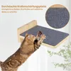 A cat is scratching on a wall-mounted cat scratching board. Voir les images du produit