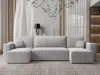 A modern U-shaped sofa in a living room setting. Náhled obrázku produktu
