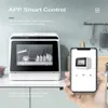 A countertop dishwasher is shown next to a smartphone displaying its app interface. Produktbild-Vorschau