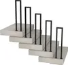 A set of modern, minimalist stairs with black U-shaped railings. Náhľad obrázku produktu