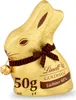 A Lindt Goldhase chocolate bunny wrapped in gold foil, wearing a brown ribbon and bell. Produktbild-Vorschau