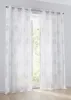 Two white sheer curtains with a purple circular pattern hang in front of a window. Produktbild-Vorschau