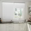 A kitchen scene with a window and blinds. Produktbild-Vorschau