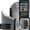 Close-up of a kettle's double-wall construction with text overlay highlighting features and a person holding the kettle in the background. Produktbild-Vorschau