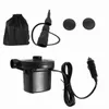 A black electric air pump with accessories, including a storage bag, nozzle attachments, and two circular cushions, laid out against a white background. Náhled obrázku produktu
