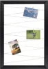 A black framed photo collage board with three photos clipped to strings. Produktbild-Vorschau