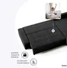 A dark gray sectional sofa is shown with a small inset image of a woman stretching in bed. Produktbild-Vorschau