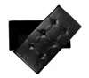 A black tufted ottoman is shown from a top-down diagonal angle against a white background. Podgląd zdjęcia produktu