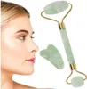 A woman's face is shown in profile next to a jade roller and gua sha tool. Náhled obrázku produktu