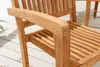 A close-up view of a wooden garden chair's armrest and seat. Produktbild-Vorschau