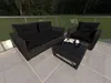 Outdoor furniture set on a patio with a garden and trees in the background. Produktbild-Vorschau