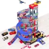 A toy parking garage with multiple levels, ramps, and toy cars. Anteprima dell’immagine prodotto