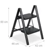 A black two-step folding ladder is shown against a white background with dimensions indicated. Voir les images du produit