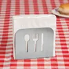 A napkin holder with cutlery cutouts sits on a red and white checkered tablecloth. Produktbild-Vorschau