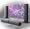 A soundbar and two tower speakers are displayed in front of a large screen showing a concert. Produktbild-Vorschau