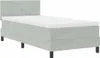 A light gray upholstered bed with a white mattress and black legs is shown against a white background. Produktbild-Vorschau