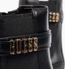 Close-up of a black Guess Chelsea boot with a gold logo strap. Voir les images du produit