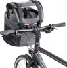 A close-up view of a bicycle handlebar with a dog carrier attached. Produktbild-Vorschau