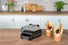 Bubble-Waffeleisen Bobby auf Holz, zwei Bubble-Waffeln mit Früchten, Keksen, Streuseln Produktbild-Vorschau