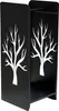 A black metal firewood rack with a white tree silhouette design on the side panels. Podgląd zdjęcia produktu