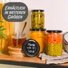 Jars of preserves and pasta on a shelf. Produktbild-Vorschau