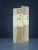 Two wooden knife blocks with labels are displayed against a dark background. Podgląd zdjęcia produktu