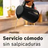 A black Bosch electric kettle is pouring water into a glass teapot on a kitchen counter. Podgląd zdjęcia produktu