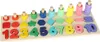 A wooden Montessori toy with numbers, shapes, and stacking rings. Produktbild-Vorschau