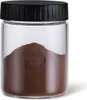 A clear studio shot of a glass jar filled with coffee grounds, topped with a black lid. Produktbild-Vorschau