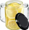 Three glass jars, one filled with lemon slices and liquid, with a black lid in the foreground. Podgląd zdjęcia produktu