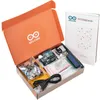 An Arduino starter kit is open in a box, with components and a project book laid out. Podgląd zdjęcia produktu