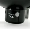 A close-up view of the bottom section of a black smoker barrel, showing a metal ring handle and ventilation holes. Podgląd zdjęcia produktu