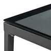 A close-up view of the corner of a table with a glass top and a metal frame. Produktbild-Vorschau