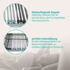 Close-up of a bed frame's slatted base and a person sleeping in bed. Produktbild-Vorschau
