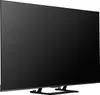A side view of a large, flat-screen television with a black screen and a black stand. Voir les images du produit