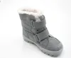A single gray boot with white fur lining is shown against a white background. Voir les images du produit