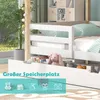 A close-up view of a white bunk bed with storage drawers, featuring a stuffed bunny and books inside one of the drawers. The text "Großer Speicherplatz" (Large Storage Space) is overlaid on the image, along with icons representing toys, clothes, and other  Náhled obrázku produktu