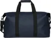 A studio shot of a navy blue duffel bag. Produktbild-Vorschau
