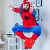 A man in a Spiderman onesie jumps in the air in a room with a desk and a typewriter. Anteprima dell’immagine prodotto