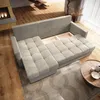 A modern living room with a sectional sofa, fireplace, and coffee table. Produktbild-Vorschau
