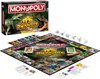 A Monopoly Dinosaurier board game box and board are displayed together on a white background. Produktbild-Vorschau