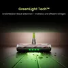 A close-up of a vacuum cleaner head with green LED lights illuminating dust on a wooden floor, with marketing text above. Produktbild-Vorschau