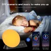 A child sleeping in bed with a sunrise alarm clock and smartphone app interfaces shown. Náhľad obrázku produktu