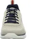 Front view of a beige sneaker with navy blue laces and accents. Voir les images du produit