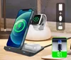 A 3-in-1 wireless charging station for a smartphone, smartwatch, and earbuds, shown on a desk. Produktbild-Vorschau